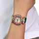 Yellow gold watch with diamonds, pink sapphires, tzavorite and Cabocon sapphires 