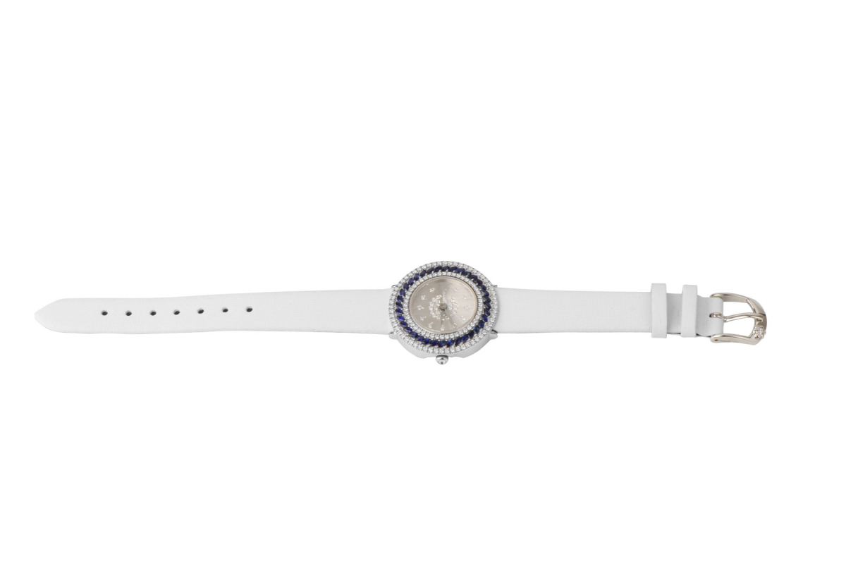 White gold watch with diamonds and blue sapphires